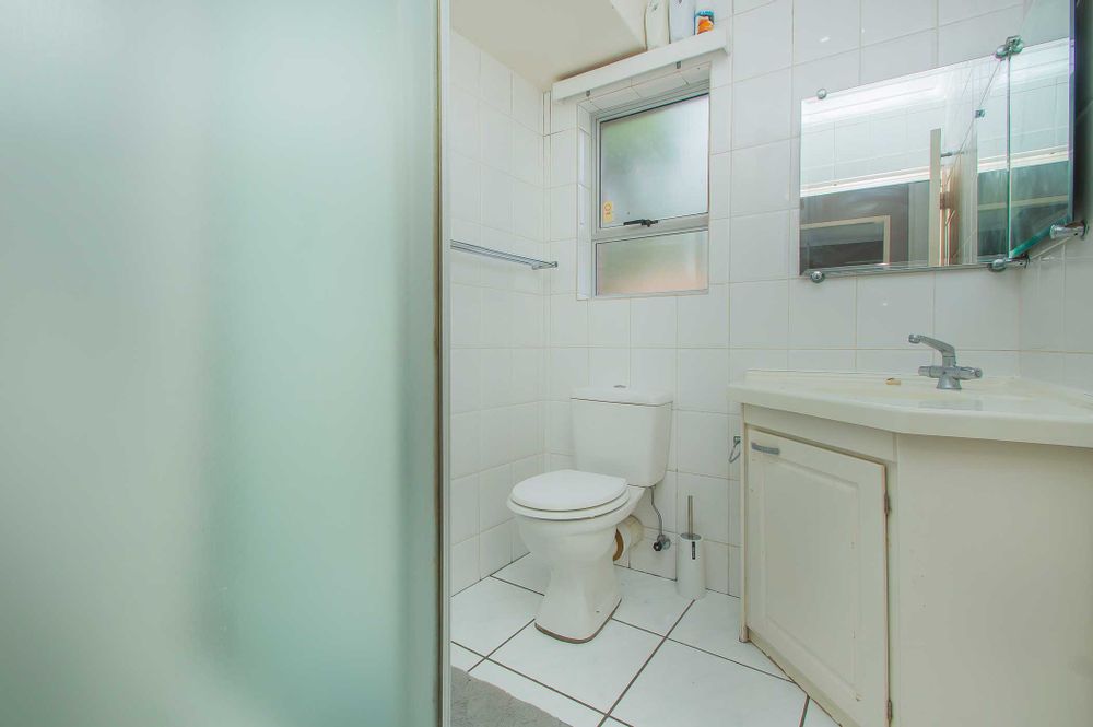 Family bathroom with shower in same finish s en-suite
