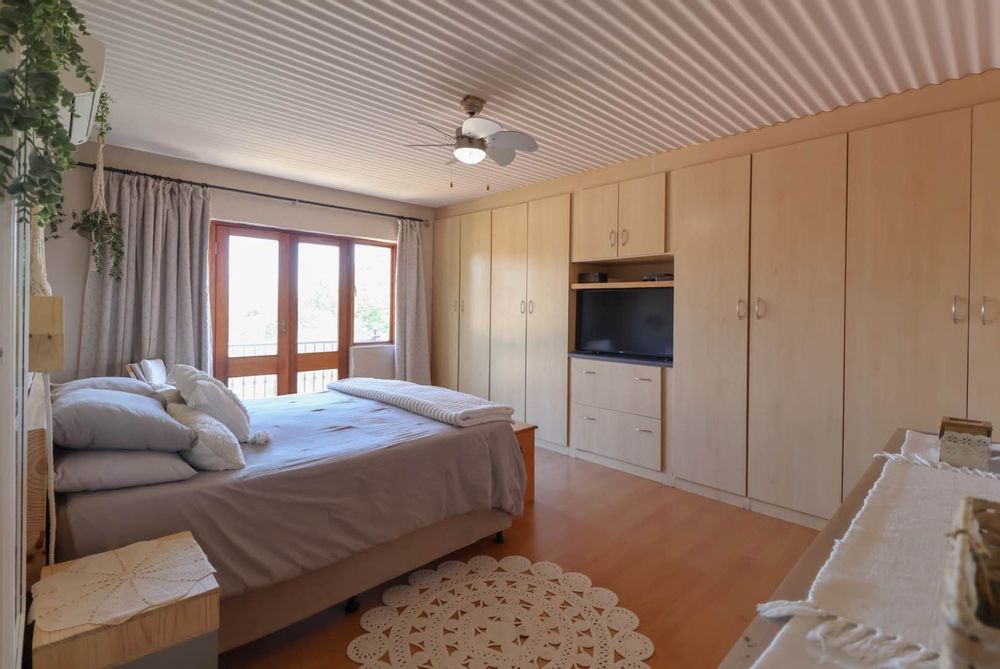 Main bedroom with balcony