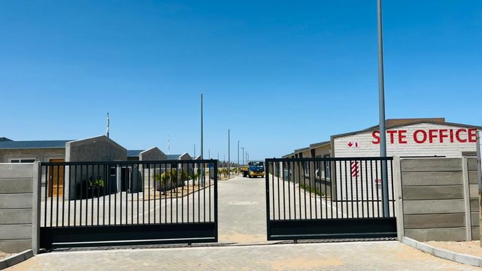 Townhouse for Sale in Walvis Bay Central: 2 bedrooms, private courtyard, energy-efficient.