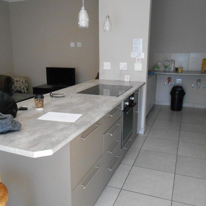 Central Swakopmund Apartment For Sale: Open-Plan Living, Secure Parking, Indoor BBQ!