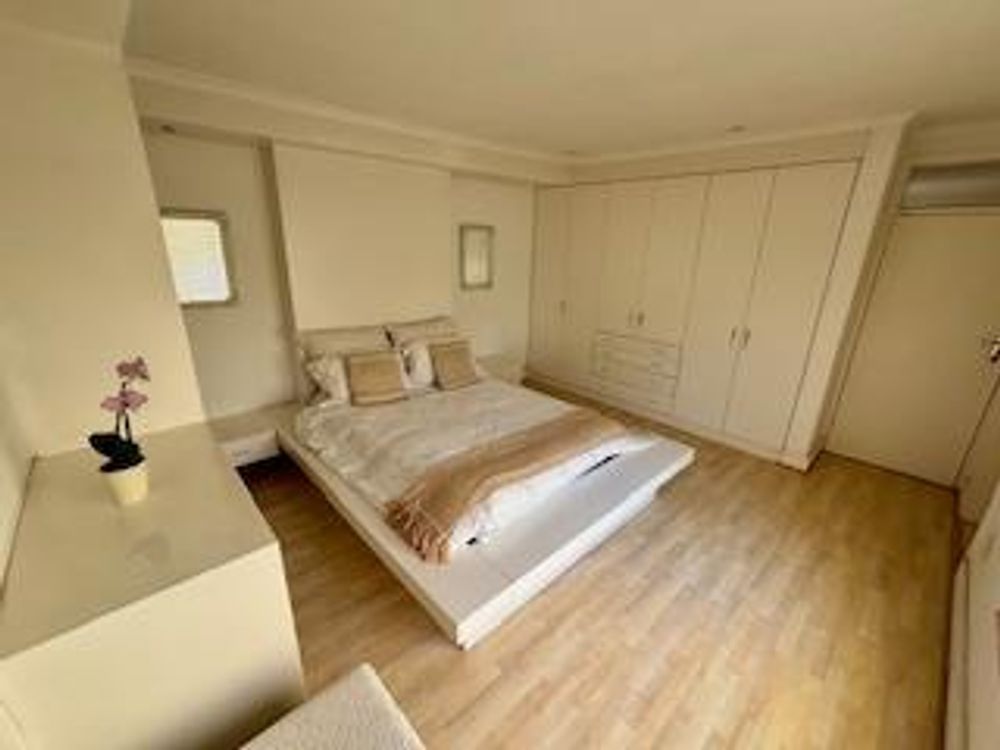 master bedroom with. en-suite bathroom