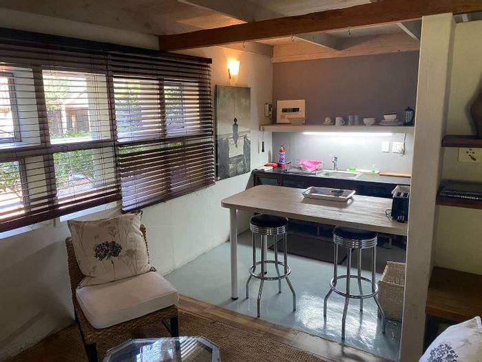 1-Bedroom Apartment To Rent in Craighall Park with garden, WiFi, and amenities nearby.