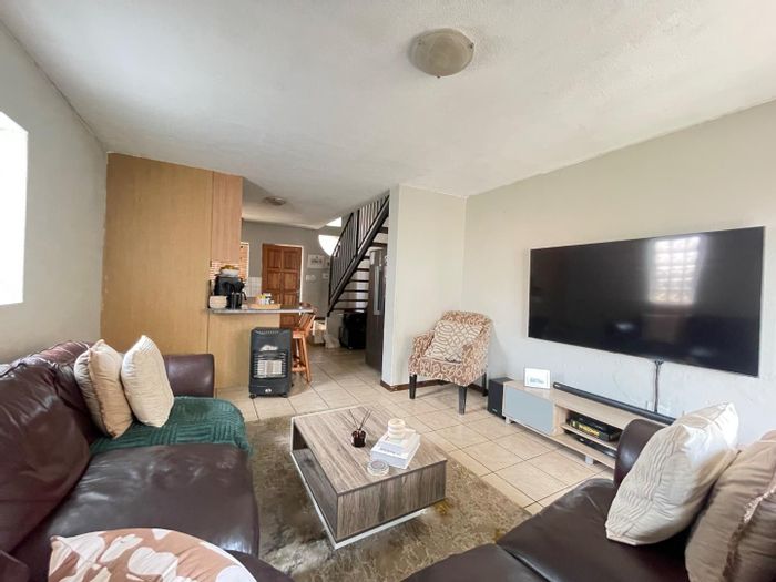 Birchleigh Apartment For Sale: 2 Bedrooms, garden, open-plan living, parking included.