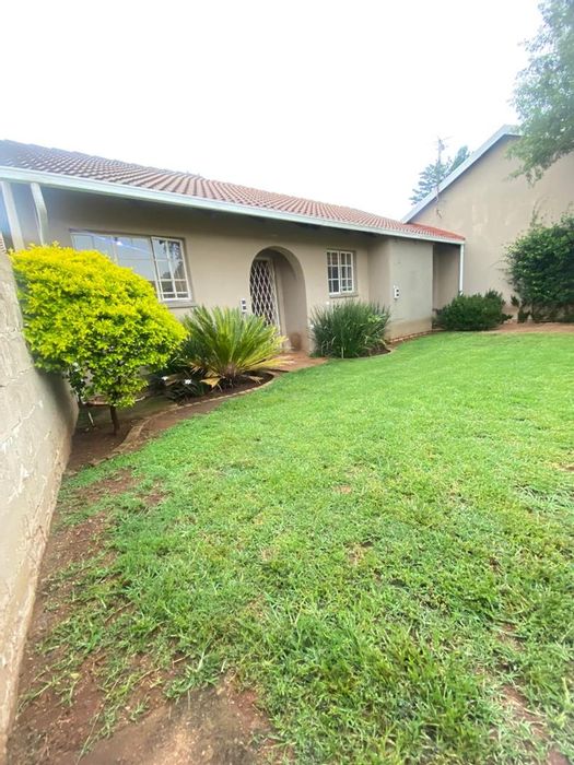 2 Bedroom Cluster For Sale in Norkem Park with garage and community access.