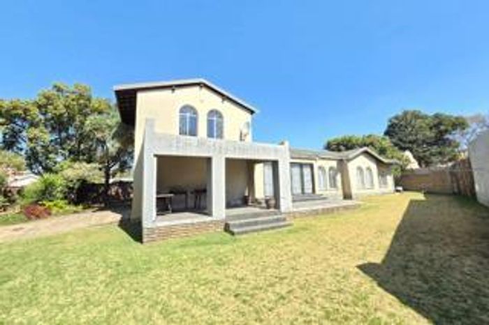 For Sale: House in Van Riebeeck Park with security, borehole, and spacious living areas.