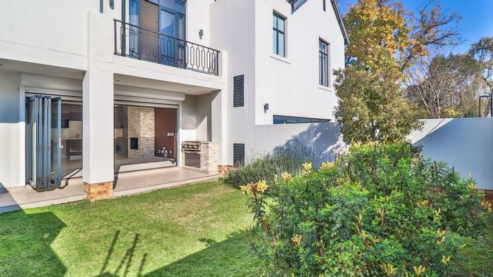 Bryanston Townhouse To Rent: 2 beds, outdoor space, gas fireplace, secure complex.