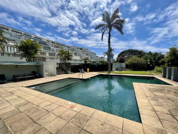 Penthouse for Sale in Umhlanga Rocks Central: Sea views, spacious patios, communal pool.