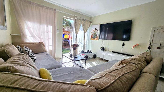 2-Bedroom Townhouse in Equestria For Sale with Courtyard, Garage, Pool Access.