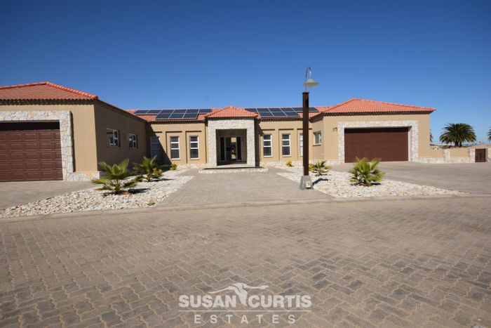 For Sale: House at Rossmund Golf Resort with 5 bedrooms, Koi pond, and solar system.