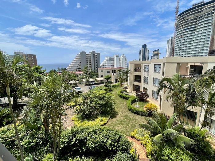For Sale: Apartment in Umhlanga Rocks Central with sea views, pool, and security.