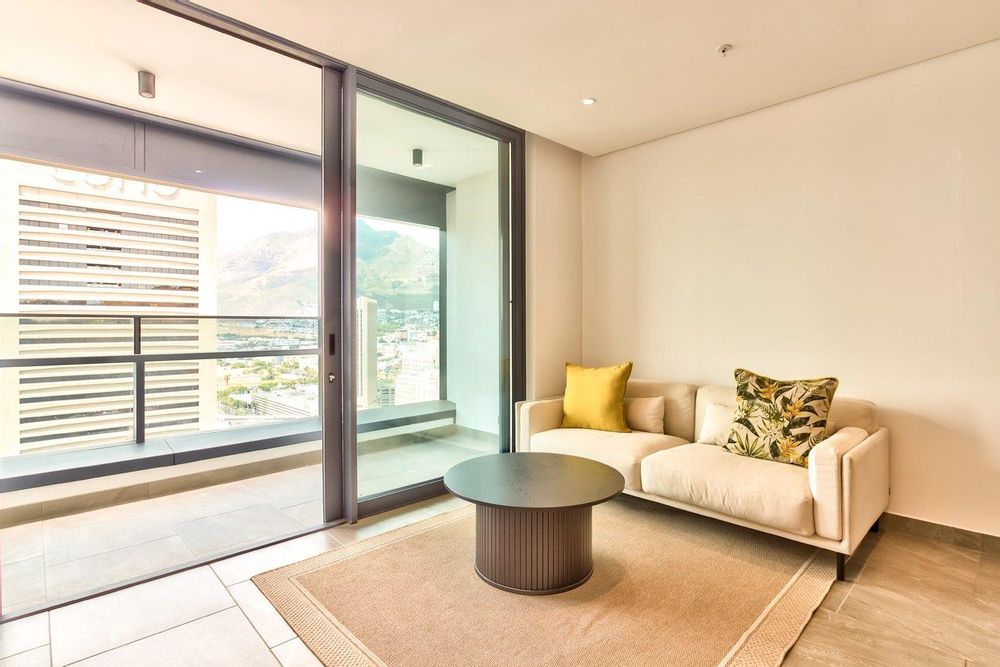 Open plan living opens onto private balcony