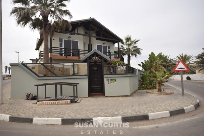 Stunning Waterfront House for Sale with 3 Levels, Beach Access, and Entertainment Room