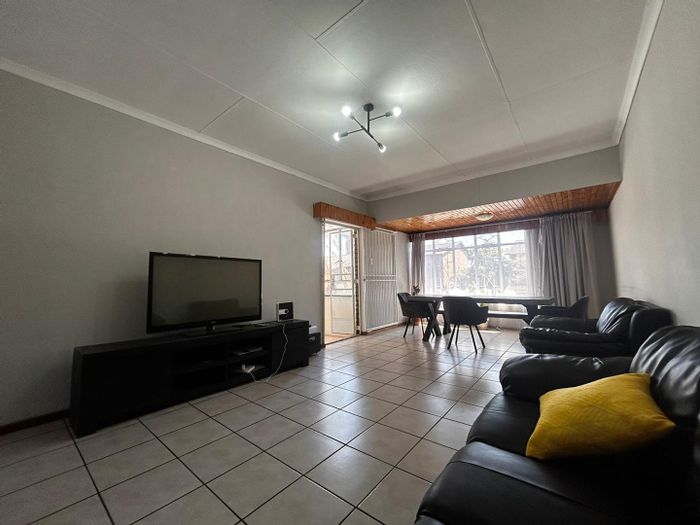 For Sale: Spacious Brackenhurst townhouse with pool, three bedrooms, and double carport.