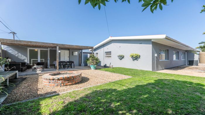 House For Sale in Melkbosstrand Central: 3 beds, flatlet, beach access, garage.