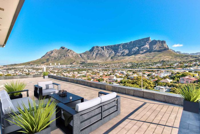 Penthouse for Sale in Tamboerskloof: Views, patio, parking, and luxury amenities.