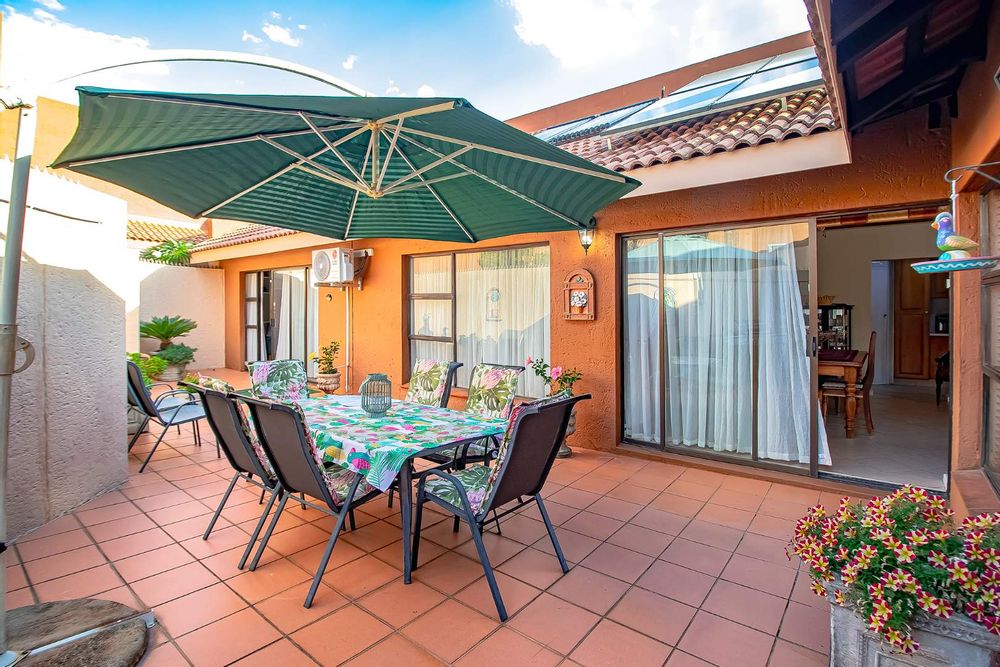 Umbrella Included plus waterspray mist on patio