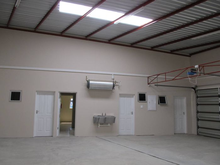 Industrial Business For Sale: Two large warehouses, multiple offices, and ample storage.