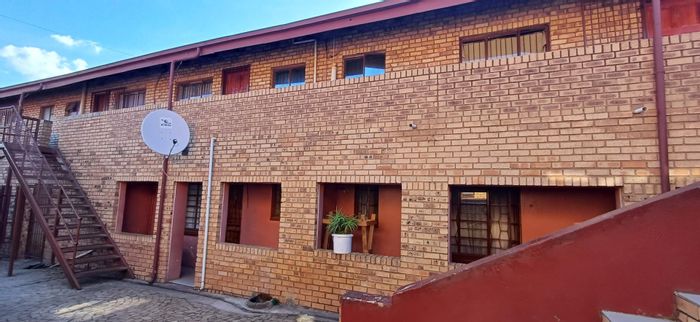 Newclare Business For Sale: 10 units with attached general store and tenants.