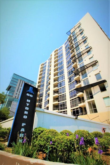 2-Bedroom Apartment To Rent in Sandton Central with generator, pool, and security.