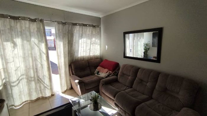 For Sale: Otjomuise Townhouse with 2 bedrooms, secure complex, and carport.