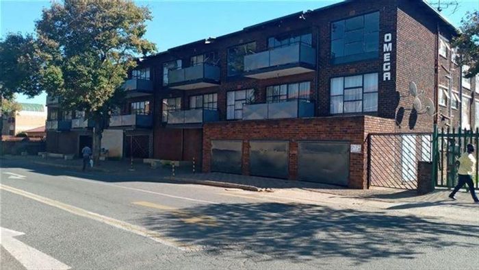For Sale: Apartment in Kempton Park Central with 2 bedrooms, security, and parking.