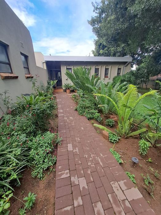 Family home in Wingate Park with pool, office, and hobby room for sale.
