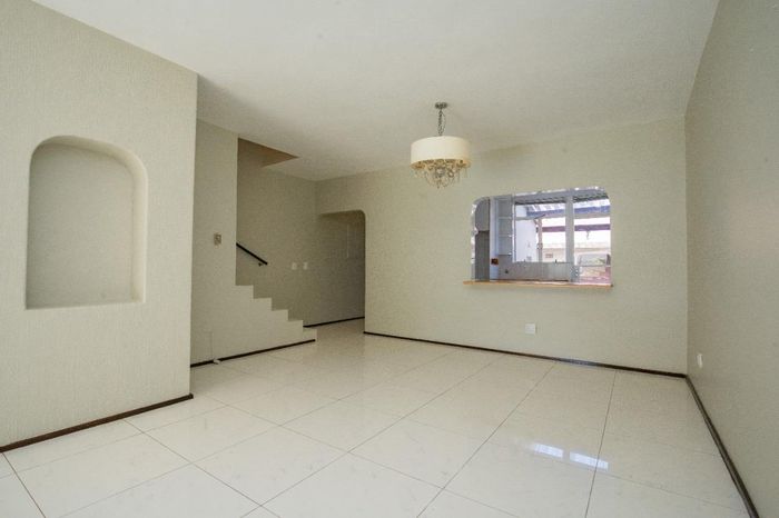 Bryanston Cluster For Sale: 2 beds, pool access, private garden, top security.