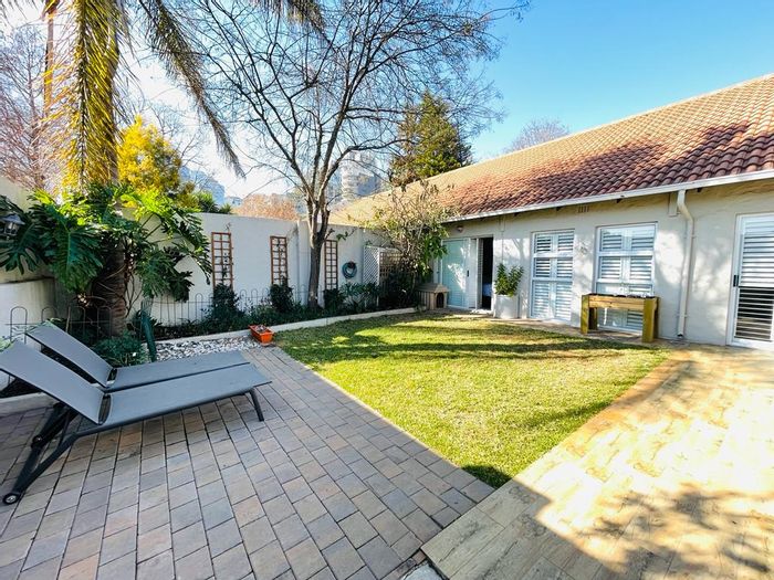 2-Bedroom Townhouse to Rent in Sandhurst with garden, garage, and security features.