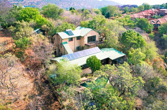 Rietondale House For Sale: Spacious 4-bedroom, solar-powered with rental potential.