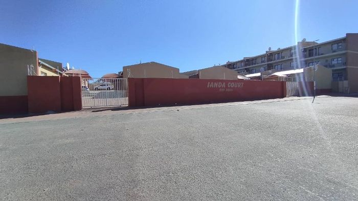 For Sale: Otjomuise townhouse with 2 bedrooms, secure complex, and backyard.