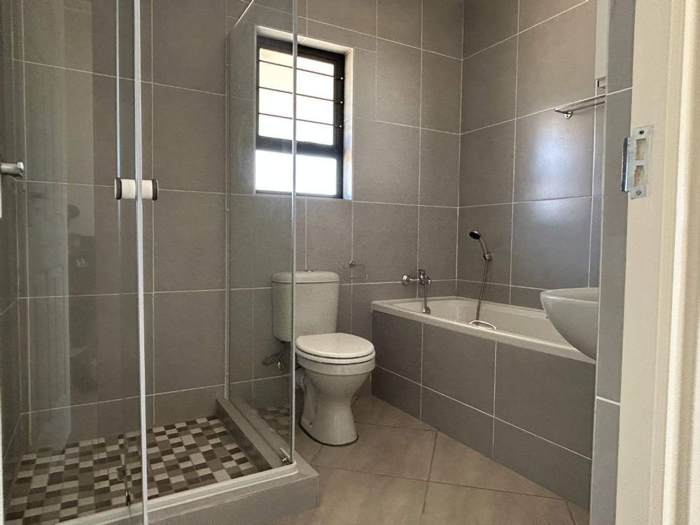 Family bathroom with shower & bath.