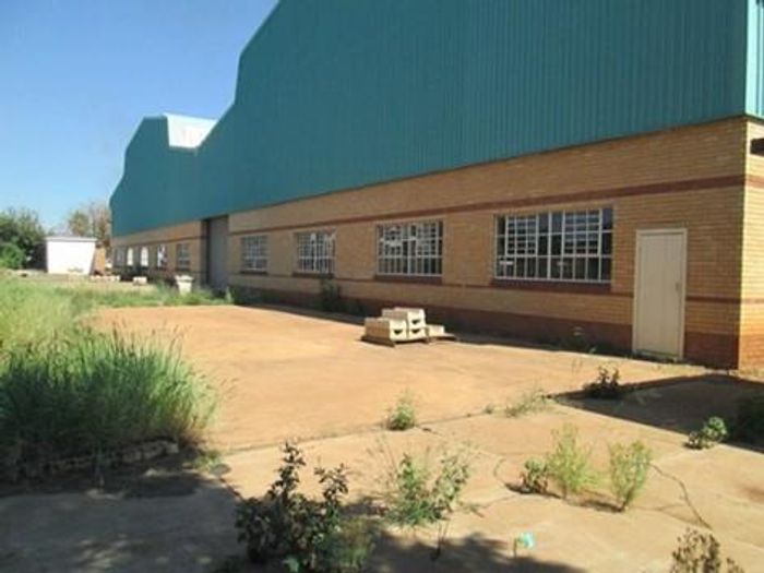 Industrial Property For Sale in Rosslyn: Large facility, ample yard, excellent access.