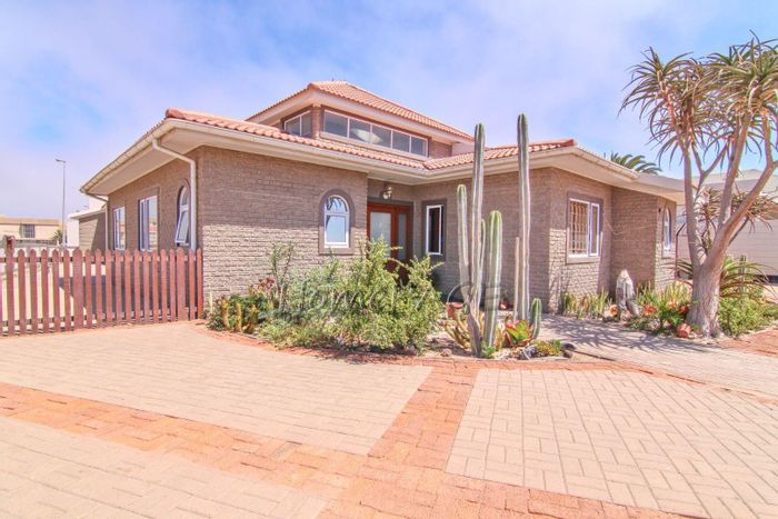 House for Sale in Swakopmund Central: 5 bedrooms, study, ample parking, security features.