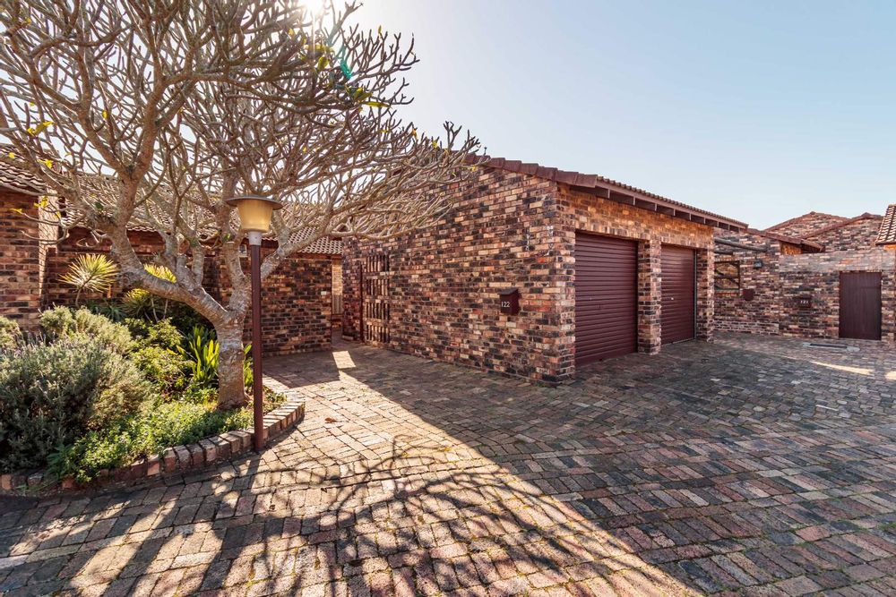 Unit from the front (one of two par ports and Double garage)
