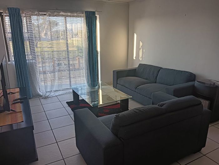 For Sale: Sea Breeze Apartment with 2 Bedrooms, Security Access, and Mountain Views.