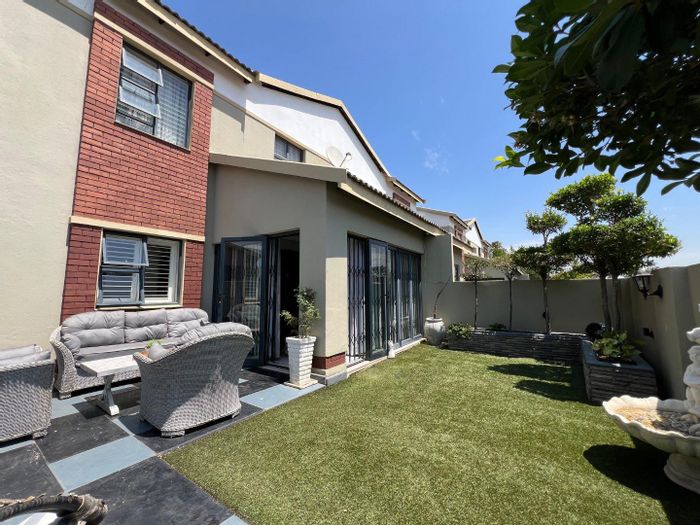 For Sale: Townhouse in Equestria with 3 beds, garden, and double garage.