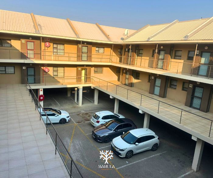 For Sale: Apartment in Windhoek Central with aircon, parking, and rental income.