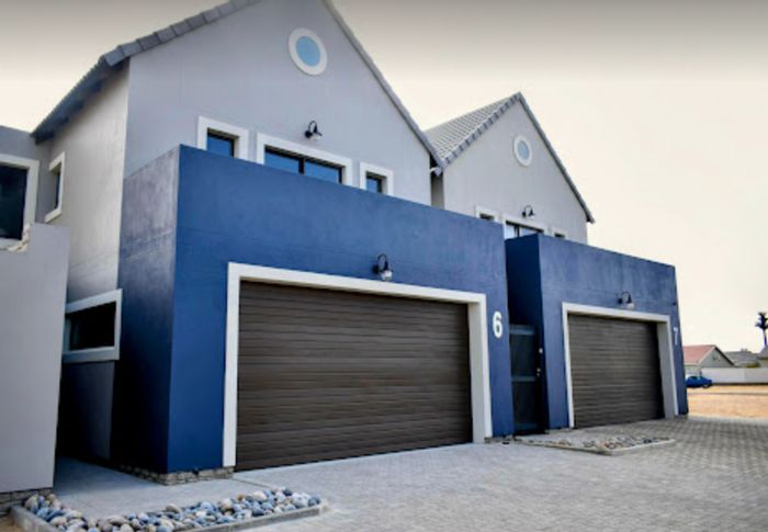 Townhouse for Sale in Swakopmund Ext 15: 3 beds, double garage, patio, garden.