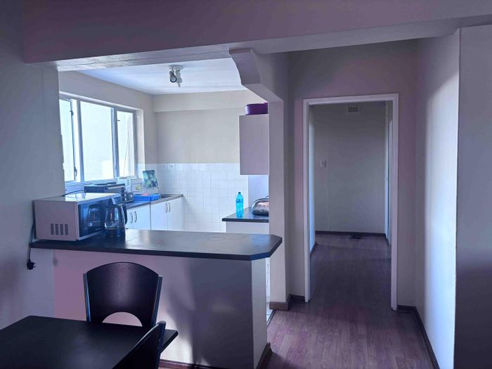 2-bedroom apartment with sea view, secure parking, and enclosed balcony in Humewood. To Rent.