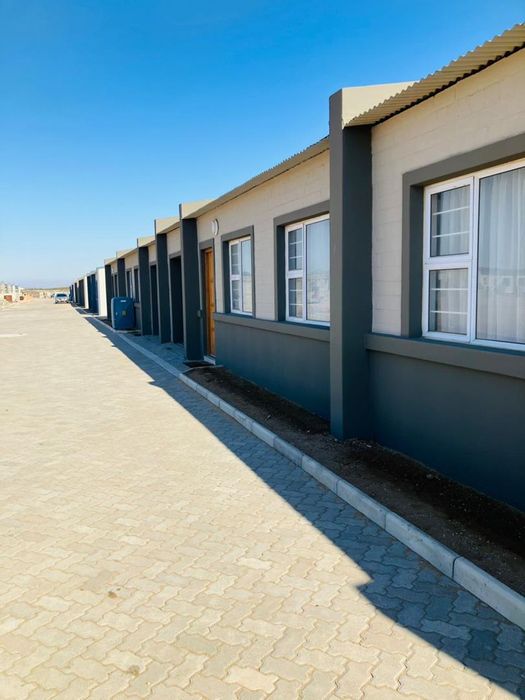 Townhouse for sale in Walvis Bay Central: 2-bed, secure living, pet-friendly.