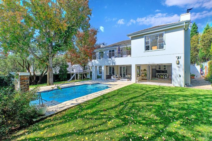 Bryanston House For Sale: Open-plan living, pool, study, and spacious garden.