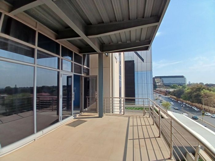 Spacious office to rent in Rosebank with adaptable layout and private balcony.