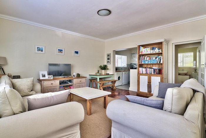 Wynberg Apartment For Sale: Ground floor, secure, spacious with balcony and parking options.