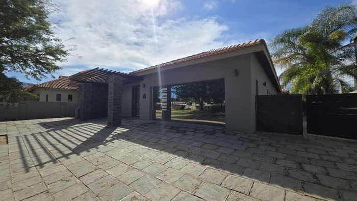 For Sale: House in The Islands Estates with 4 bedrooms, pool, and canal views.