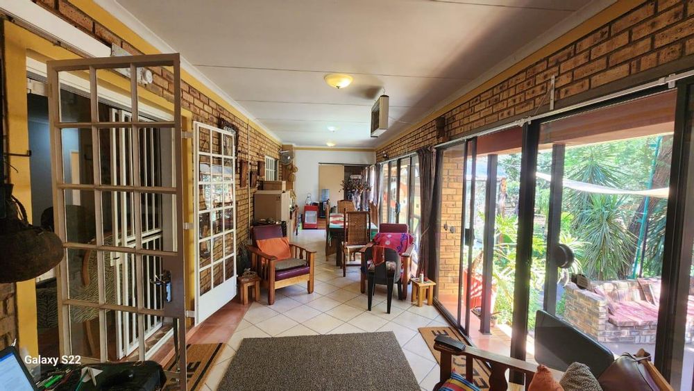 Spacious porch with glass sliding doors