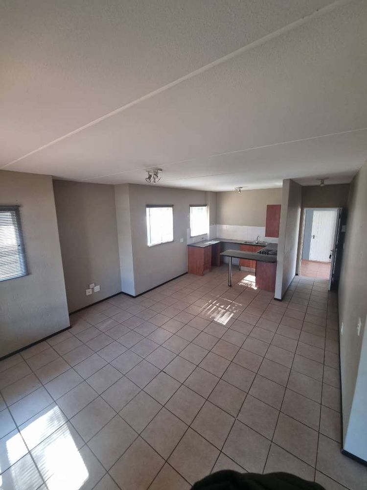 Open plan Kitchen and Lounge