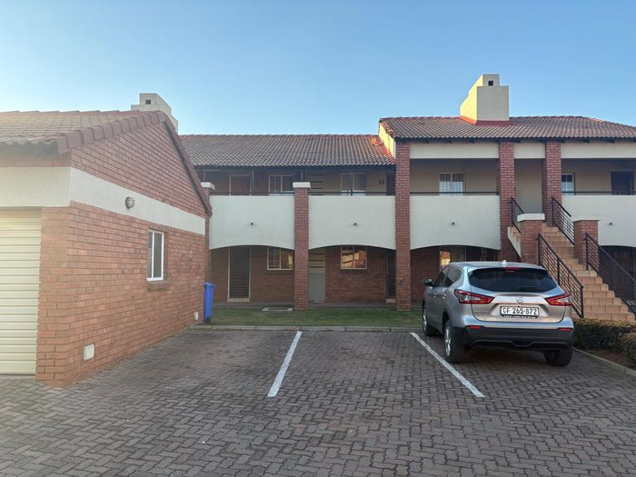 Mooikloof Ridge Apartment For Sale: 2-bed, private garden, lock-up garage, secure estate.