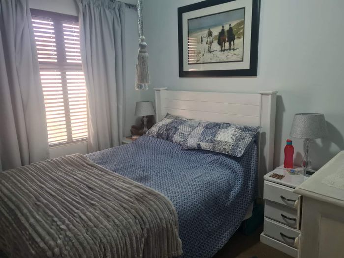 Apartment For Sale in Zwartkop Golf Estate with 2 beds, parking, and golf views.