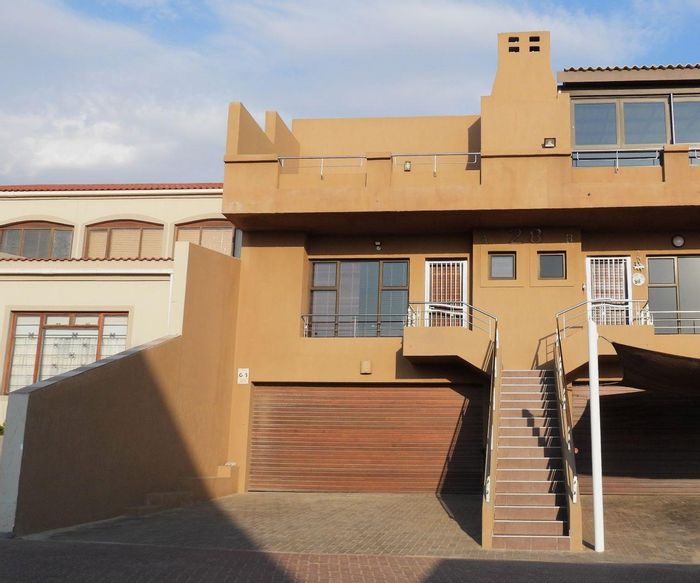 Walvis Bay Central Townhouse - Tri-level oasis with panoramic views, private deck, and double garage.