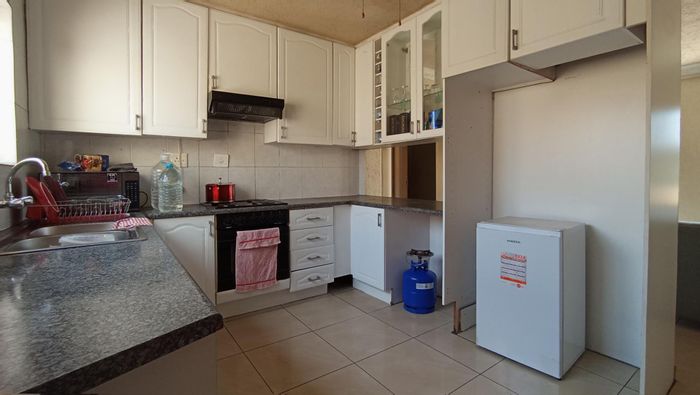 For Sale: 2-bedroom apartment in Mondeor, near schools and shopping amenities.